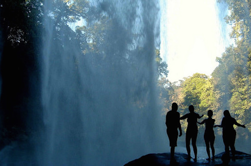 Embracing the energy at the Misol Ha Falls in Mexico